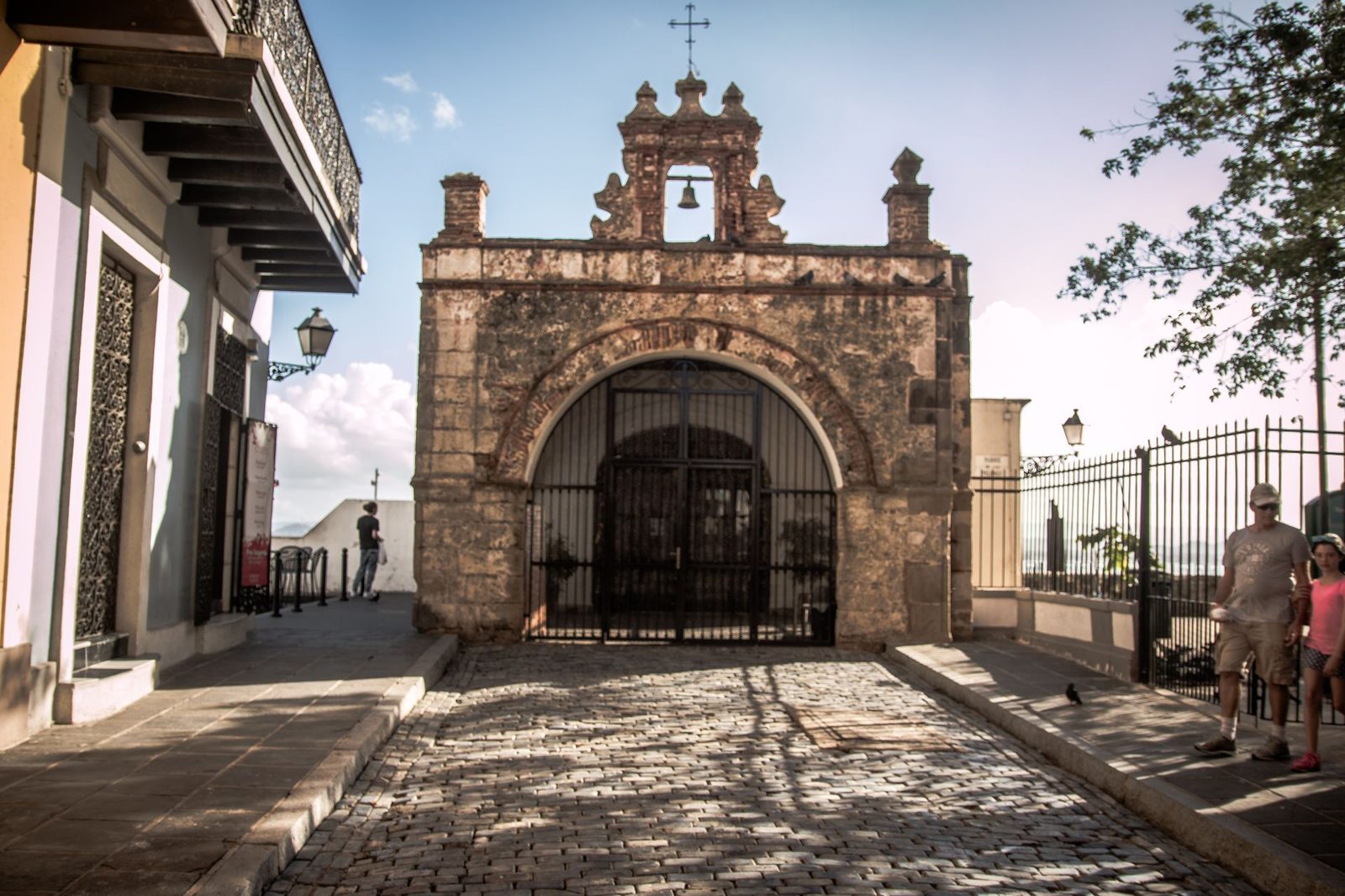Capilla del Cristo chapel at the end of a cobblestone street in Old San Juan